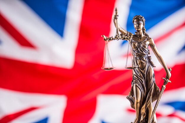 lady-justice-united-kingdom-flag-symbol-law-justice-with-uk-flag-brexit_341862-3237